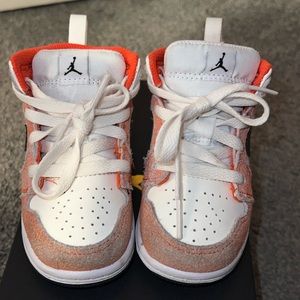 Red and white Jordans